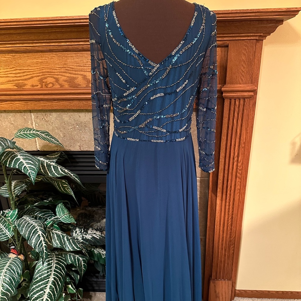 A beautiful beaded Jkara evening gown or wedding gown. Fully lined.